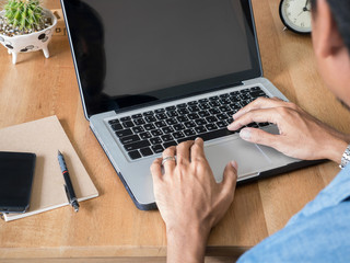 Man using laptop computer