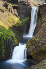 Fototapeta na wymiar Long exposure of big waterfall near Skogar in south of Iceland.