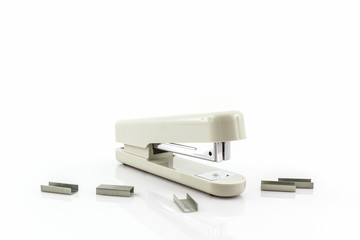 White Stapler with staples wires.