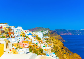 View to the sea from Oia the most beautiful village of Santorini island in Greece - obrazy, fototapety, plakaty