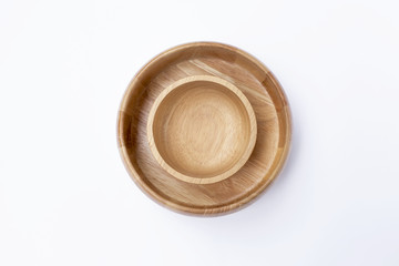 Wooden bowl with natural texture on white background