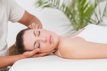 Obraz na płótnie Canvas Woman receiving neck massage 
