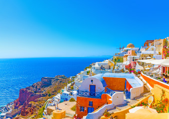 View to the sea from Oia the most beautiful village of Santorini island in Greece - obrazy, fototapety, plakaty