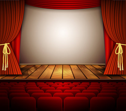A theater stage with a red curtain, seats.