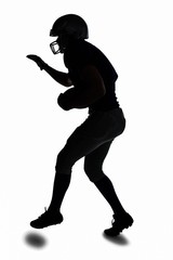 Fototapeta na wymiar Silhouette sportsman playing American football