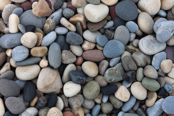 Pebbles on Bracelet Bay on the Gower peninsular, Swansea, UK.