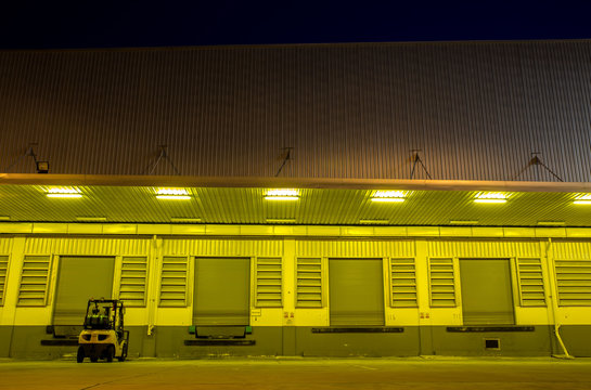 Warehouse with yellow lights at night