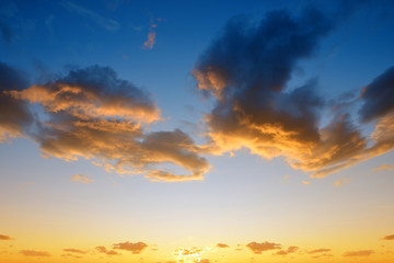 Colorful sky with clouds at sunset. Nature background.