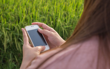 women hand using smart phone