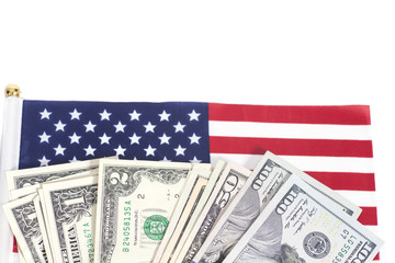 Dollars bills on American flag