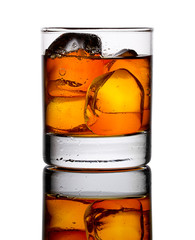 Close up of glass of whiskey isolated