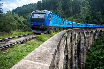 Train passing over Nine Arches Bridge in Demodara, Sri Lanka. One of major tourist attraction in Sri Lanka