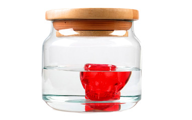 Water jar and red skull isolated on white