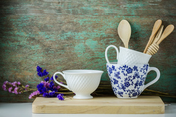 Wooden kitchen utensils and coffee cups