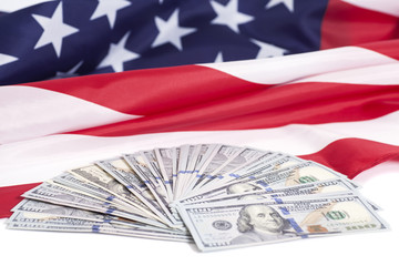 One hundred dollar bills with American flag