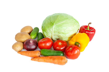 Composition with raw vegetables on white