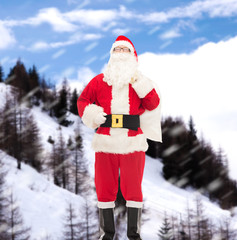 man in costume of santa claus with bag