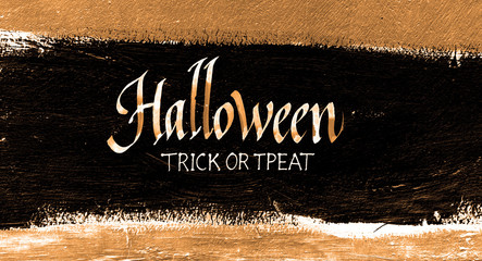 Trick or treat.typography halloween poster with calligraphy on the wall texture. Iinvitation banner. Hand lettering on the grunge background.