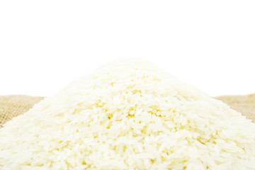 thai raw rice on sack isolated white background