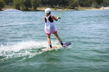 Young girl wakeboarder