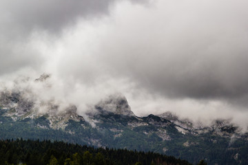 misty landscape in mountains of Dinaric Alps in Durmitor National Park in rainy day