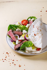 Taco with feta cheese and beef