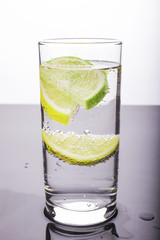 Soda with lemon and lime in the glass