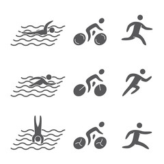 Silhouettes of figures triathlon athletes.