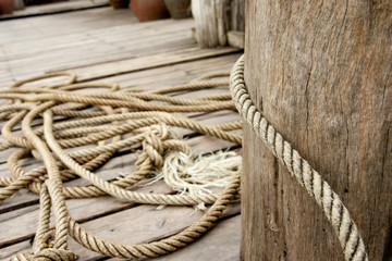 rope and a wooden pole