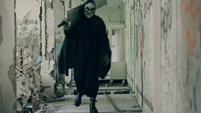 Demon in flesh with huge machete walking along corridor of abandoned building