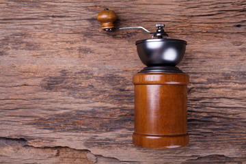 coffee grinder on wood background