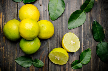 Fresh lime on wooden background