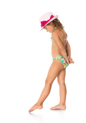 girl in a bathing suit and hat