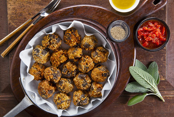 fried eggplant appetizer. vegetarian aubergine balls. with tomat