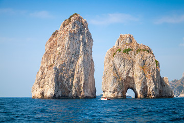 Fototapeta na wymiar Capri island, Faraglioni rocks. Mediterranean Sea