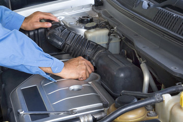 Car repair service, Auto mechanic repairing car engine
