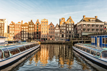 Fototapeta premium Traditional old buildings in downtown Amsterdam, The Netherlands