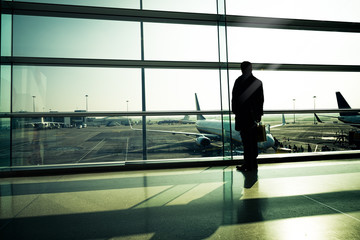 Fototapeta premium Traveler silhouettes at airport,Dublin