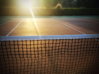 tennis court and sunset