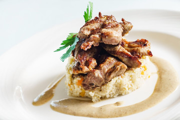  meat served with  millet