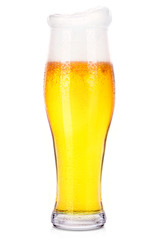 Frosty glass of light beer isolated