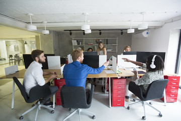 Fototapeta premium Young people in the office