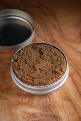 Dry snuff a smokeless tobacco made from ground tobacco leaves popular in the 18th century
