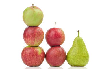 Apples and one pear isolated on white background