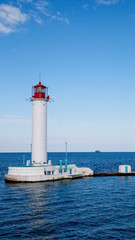 Fototapeta na wymiar Lighthouse in Odessa sea port, Ukraine