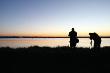 Fototapeta na wymiar Fotografi al tramonto nelle saline di Cervia