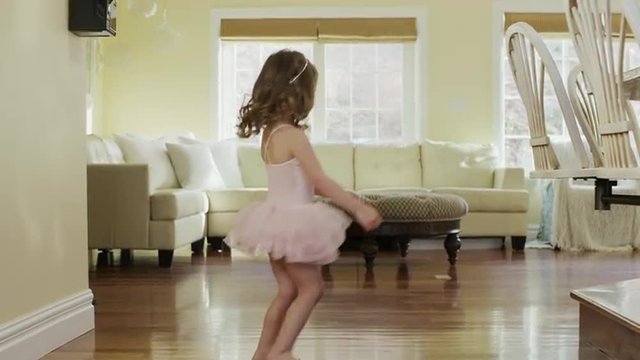 Medium slow motion panning shot of girl dancing in ballerina costume / Cedar Hills, Utah, United States