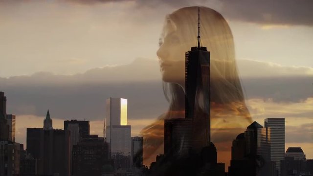 Wide double exposure shot of woman over city skyline / New York City, New York, United States