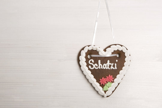 Bavarian ´darling´ gingerbread heart for Oktoberfest backgroun