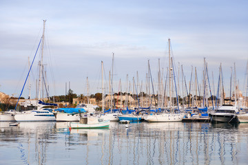 Early winter morning at Marsamxett harbour. Many sailing yachts.